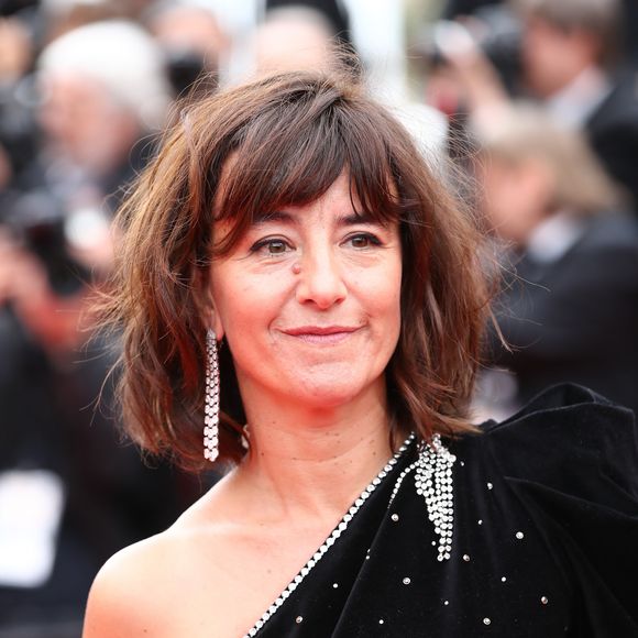 Privée de cette première rencontre avec le public, elle promet déjà de revenir partager cette œuvre intime.

Romane Bohringer - Montée des marches du film "The Dead Don't Die" lors de la cérémonie d'ouverture du 72ème Festival International du Film de Cannes. Le 14 mai 2019
© Jacovides-Moreau / Bestimage
