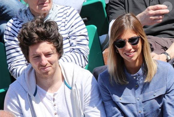 Alexandra Rosenfeld et son compagnon Jean Imbert assistent au quart de finale entre Jo-Wilfried Tsonga et Roger Federer lors des Internationaux de France de tennis a Roland-Garros le 4 juin 2013. 
Jacovides / Agence / Bestimage