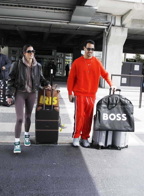 Iris Mittenaere et Diego El Glaoui - à l'aéroport de Nice lors du 76ème Festival International du Film de Cannes, le 16 mai 2023. (Denis Guignebourg / Bestimage).