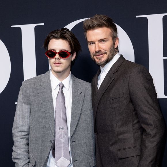 Cruz Beckham et son père David Beckham lors du défilé Dior lors de la Fashion Week Homme automne-hiver de Paris, France. © Olivier Borde/Bestimage 