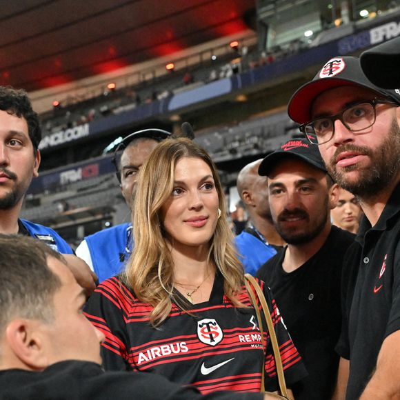 Iris Mitteneare, Antoine Dupont et son frère Clément Dupont - Victoire des Toulousains en finale du Top 14, face à Montpellier (28 - 20) au stade de France, le 27 juin 2026. 
© Christian Liewig / Bestimage
