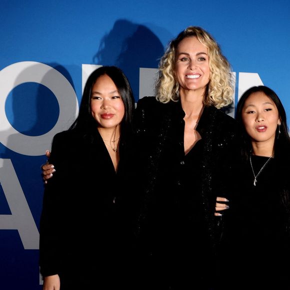 Laeticia Hallyday et ses filles Joy et Jade - Photocall du vernissage de l'exposition "Johnny Hallyday, l'exposition" au Palais des Expositions à Paris. Le 21 décembre 2023
© Dominique Jacovides / Bestimage
