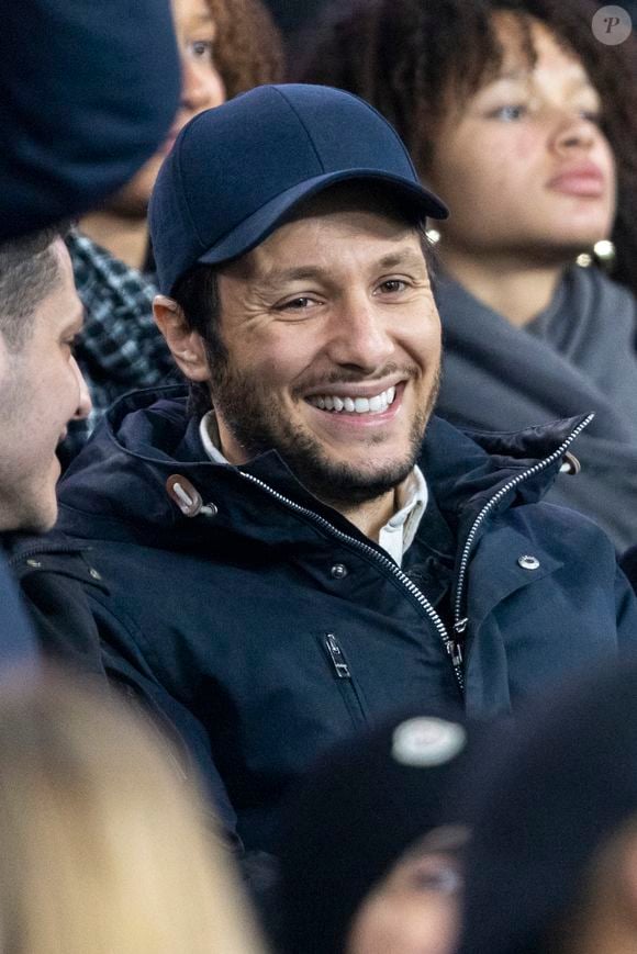 Vianney dans les tribunes du match de Ligue 1 Uber Eats "PSG-Lille" (3-1) au Parc des Princes à Paris le 10 février 2024. © Cyril Moreau/Bestimage