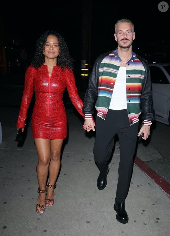 Son mari, M. Pokora, se trouvait alors à Aix-en-Provence avec leurs fils Kenna et Isaiah, engagé dans une série de concerts dans le cadre de son Adrenaline Tour.

Christina Milian est arrivée au dîner dans une robe rouge à imprimé peau de serpent avec son mari Matt Pokora au Catch Steak LA à West Hollywood. © Backgrid USA / Bestimage