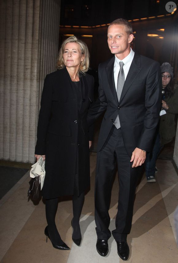 Claire Chazal et Arnaud Lemaire quittent le défilé de mode 'Armani' qui s'est tenu place Vendôme, le 6 juillet 2010. Guignebourg Denis/ABACA
