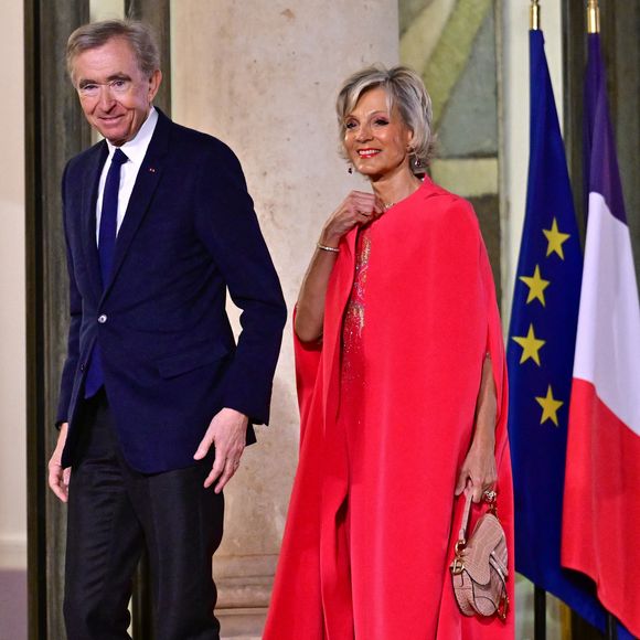 Bernard Arnault et sa femme Hélène Mercier au dîner d'état donné en l'honneur du président de l'Ouzbékistan au palais présidentiel de l'Elysée, à Paris, France, le 12 mars 2025. © Christian Liewig/Bestimage