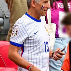 Nagui dans les tribunes de la demi-finale du Championnat d'Europe de football (Euro 2024) entre l'Espagne et la France (2-1) à Munich, Allemagne, le 9 juillet 2024. © Bestimage