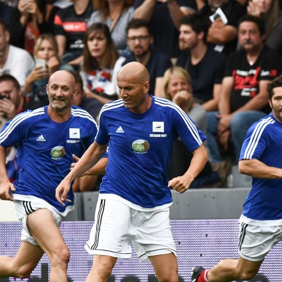 Zinédine Zidane, Bixente Lizarazu et Fabien Barthez - Les champions du monde de 98 ont défié les rugbymen du Stade toulousain lors d'une rencontre caritative pour l’association de Pascal Olmeta "Un sourire, un espoir pour la vie" sur la pelouse du stade Ernest Wallon à Toulouse, France, le 10 juillet 2017. © Agence/Bestimage