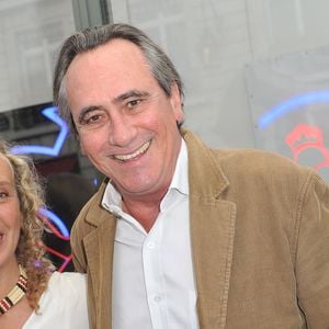 Valeria Attinelli, Philippe Lavil -  Vernissage de l'exposition " Allumeuse" de Valeria Attinelli a la galerie Caplain a Paris le 18 juin 2013.