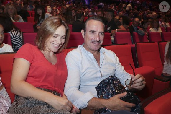 Exclusif - Nathalie Pechalat et son mari Jean Dujardin - People à la représentation exceptionnelle du spectacle musical "Sur la route Enchantée" de Chantal Goya au Palais des Congrès de la Porte Maillot à Paris - © Jack Tribeca / Bestimage