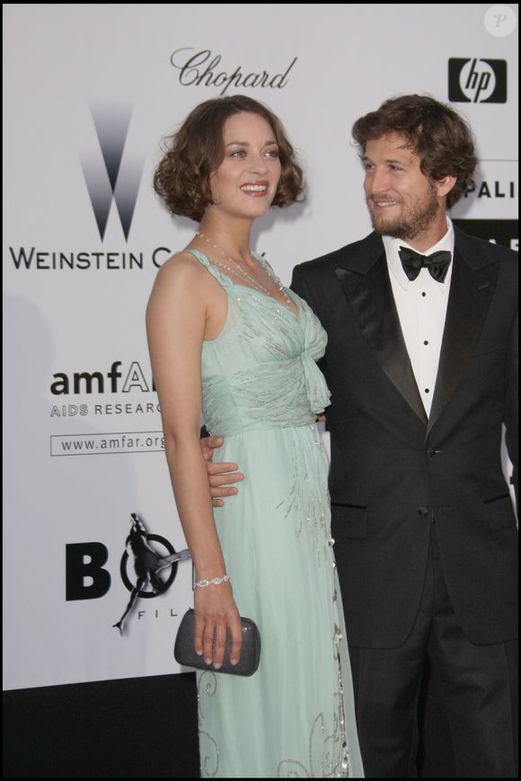 Marion Cotillard, Guillaume Canet - Soirée amfAR, le cinéma contre le sida à l'hôtel du Cap - 62e Festival du film de Cannes. BORDE-JACOVIDES / BESTIMAGE