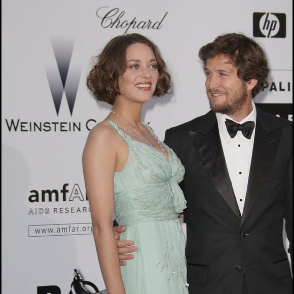 Marion Cotillard, Guillaume Canet - Soirée amfAR, le cinéma contre le sida à l'hôtel du Cap - 62e Festival du film de Cannes. BORDE-JACOVIDES / BESTIMAGE