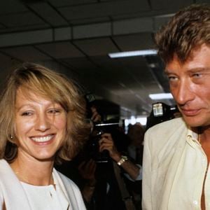 Archives En France, à Cannes, Nathalie BAYE et son compagnon Johnny Hallyday lors du Festival de Cannes en  1984 © Michel Croizard via Bestimage