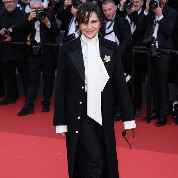 Avec Jurana, sa société civile immobilière reprenant les syllabes du trio, Juliette Binoche entend certainement renforcer son héritage.

Juliette Binoche lors de la première d'Amarga Navidad au 79ème Festival de Cannes, le 19 mai 2026, France. Crédit : Doug Peters/Empics