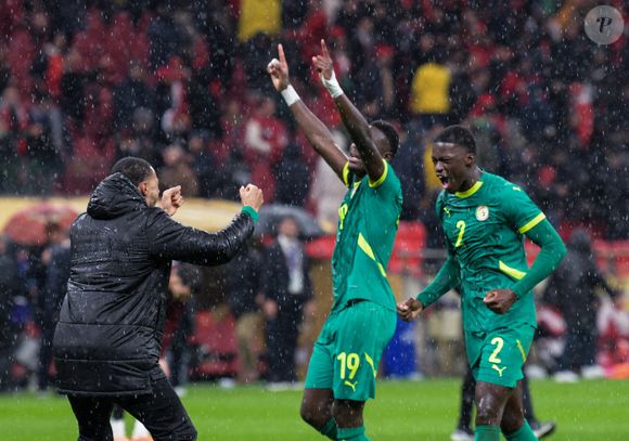 Les joueurs du Sénégal célèbrent leur victoire après avoir remporté la finale de la Coupe d'Afrique des Nations entre le Sénégal et le Maroc à Rabat, au Maroc, le 18 janvier 2026. (Photo by Aissa/Xinhua/ABACAPRESS.COM