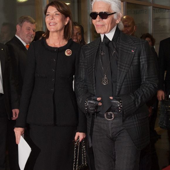 Le créateur Karl Lagerfeld et la princesse Caroline de Monaco arrivent à la cérémonie du 'Menschen in Europa Charity Award' ('Personnes en Europe') au Media Centre Passau, à Passau, en Allemagne, le 12 décembre 2011. La princesse est récompensée pour son engagement dans l'organisation caritative Amade Mondiale pour ses enfants. Photo Armin Weigel/DPA/ABACAPRESS.COM