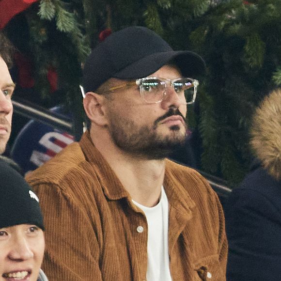 Florent Manaudou - Célébrités dans les tribunes du match de Ligue 1 McDonald's opposant le Paris Saint-Germain (PSG) à Lyon (3-1) au Parc des Princes à Paris le 15 décembre 2024. © Cyril Moreau/Bestimage