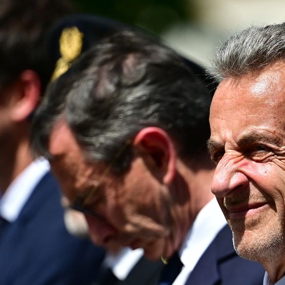 Bruno Retailleau, Ministre d'État, ministre de l'Intérieur, et l'ancien président de la République Nicolas Sarkozy lors d'une cérémonie en l'hommage à Aurélie Fouquet, la policière municipale de 26 ans avait été tuée lors de l'attaque d'un fourgon blindé le 20 mai 2010, à Villiers-sur-Marne (en banlieue parisienne), Val-de-Marne, France, le 20 mai 2025. © Christian Liewg/Bestimage