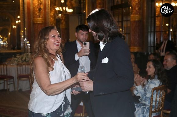 Youssra (Actrice et chanteuse égyptienne) et Stéphane Rolland - Stéphane Rolland fête ses 60 ans dans le salon Opéra de l’Hôtel Intercontinental à Paris, France, le 08 Juillet 2026. 

© Bertrand Rindoff / Bestimage