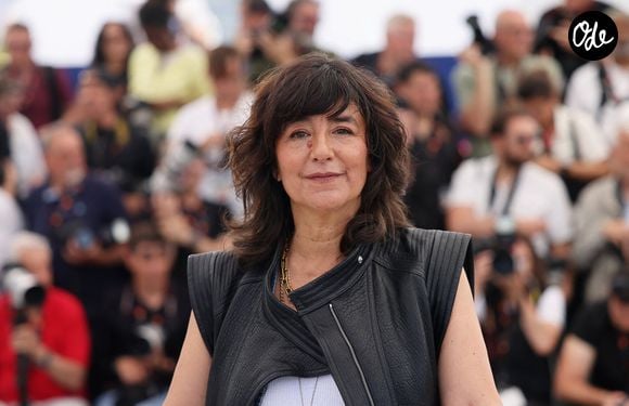 Romane Bohringer au photocall de "Dites-lui que je l'aime" lors du 78ème Festival International du Film de Cannes, le 19 mai 2025. 

© Jacovides / Moreau / Bestimage