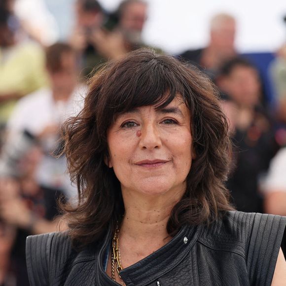 Romane Bohringer au photocall de "Dites-lui que je l'aime" lors du 78ème Festival International du Film de Cannes, le 19 mai 2025. 

© Jacovides / Moreau / Bestimage