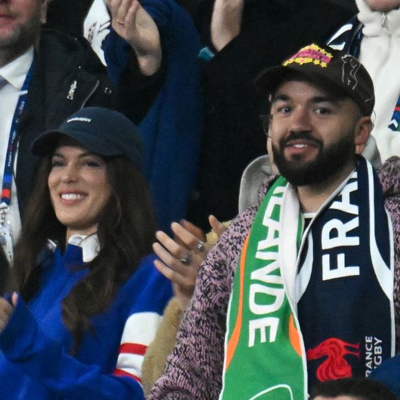Iris Mittenaere, Oli - Célébrités dans les tribunes du match d'ouverture du Tournoi des six nations : France-Irlande (36-14) au Stade de France à Saint-Denis le 5 février 2026. © Lionel Urman/Bestimage