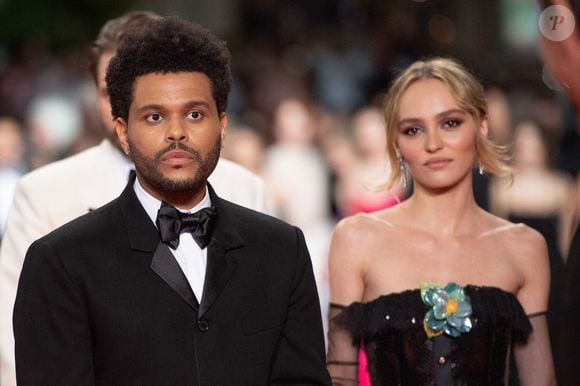 Abel "The Weeknd" Tesfaye et Lily-Rose Depp assistant à la première de The Idol dans le cadre du 76e Festival de Cannes à Cannes, France, le 22 mai 2023. Photo par Aurore Marechal/ABACAPRESS.COM