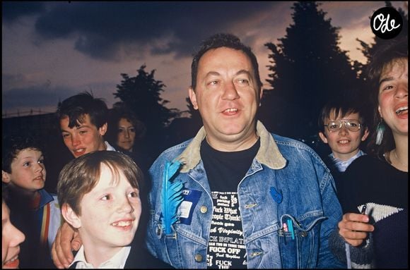 Archives - Coluche lors d'une manifestation de Touche pas à mon pote avec son fils aîné Romain Colucci
Crédit : AGENCE / BESTIMAGE