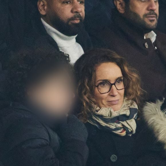 Marie-Sophie Lacarrau et son fils - Célébrités dans les tribunes du match de Ligue 1 McDonald's opposant le Paris Saint-Germain (PSG) à L’AS Monaco (4-1) au Parc des Princes à Paris le 7 février 2024. © Cyril Moreau/Bestimage