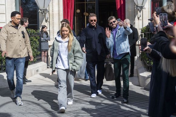 David Beckham et sa fille Harper - Les Beckham quittent leur hôtel La Réserve, à Paris, le 8 mars 2025.  GOFF INF / BESTIMAGE