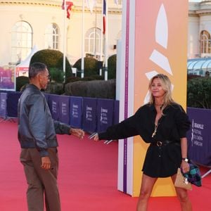 Roschdy Zem et sa compagne Sarah Poniatowski sur le tapis rouge lors de la première du film 'L'Invitation' pendant la 52ème édition du Festival du Cinéma Américain de Deauville, France, le 5 septembre 2026. © Denis Guignebourg/Bestimage
