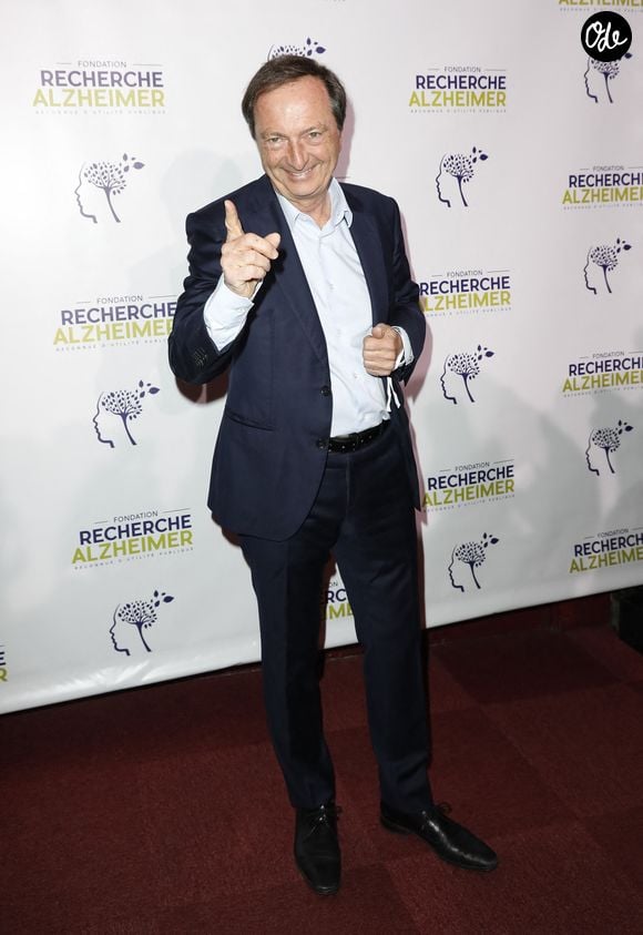 Michel-Édouard Leclerc - Photocall du XVème gala pour la Fondation Recherche Alzheimer à l'Olympia à Paris le 14 mars 2022. Sous la direction artistique de P. Souchon, des grands noms de la chanson française se mobilisent autour d'un concert sur le thème « 2 générations chantent pour la 3ème". L'intégralité des bénéfices de cette soirée servira à financer la recherche sur la maladie d'Alzheimer. © Photo Marc Ausset-Lacroix/Bestimage