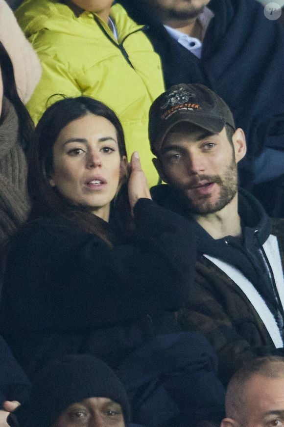 Exclusif - Louis Sarkozy et sa femme Natali Husic   - People en tribunes du match de Ligue 1 Uber Eats "PSG contre Reims" (1-1) au Parc des Princes à Paris le 29 janvier 2023.