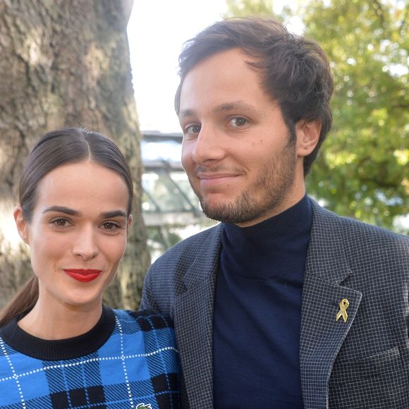 Vianney Bureau (Vianney), sa compagne Catherine Robert - People au défilé Lacoste Collection Prêt-à-Porter Printemps/Eté 2020 lors de la Fashion Week de Paris, le 1er octobre 2019. © Veeren Ramsamy-Christophe Clovis/Bestimage