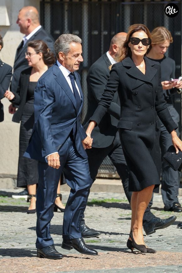 Nicolas Sarkozy et sa femme Carla Bruni - Arrivées aux obsèques de Mathilde Favier en l'église Saint-Sulpice à Paris le 31 aout 2026. © Dominique Jacovides-Cyril Moreau/Bestimage