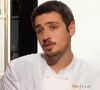 C'est dans le minuscule village de Saint-Igest, qui compte moins de 200 âmes, que le chef a décidé de poser ses couteaux. 

Quentin Bourdy dans la saison 4 de Top Chef, sur M6.