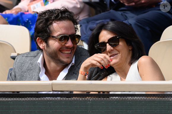 Florence Foresti et Alexandre Kominek dans les tribunes lors des Internationaux de France de tennis à Roland Garros le 29 mai 2022 à Paris, France. Photo by Laurent Zabulon/ABACAPRESS.COM