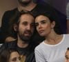 Plus connu grâce au groupe Daft Punk puisqu'il est l'un des deux personnages qui composent le duo
Elodie Bouchez et son mari Thomas Bangalter (groupe Daft Punk) dans les tribunes du stade de France lors du match de ligue des nations opposant la France à l'Allemagne à Saint-Denis, Seine Saint-Denis, France, le 16 octobre 2018. La France a gagné 2-1. AGENCE / BESTIMAGE