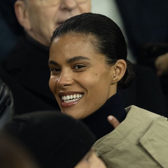 Tina Kunakey - Célébrités dans les tribunes lors du match de Ligue des Champions entre le Paris Saint Germain contre Tottenham Hotspur Football Club (5-3) au Parc des Princes à Paris le 26 novembre 2025. © Cyril Moreau/Bestimage