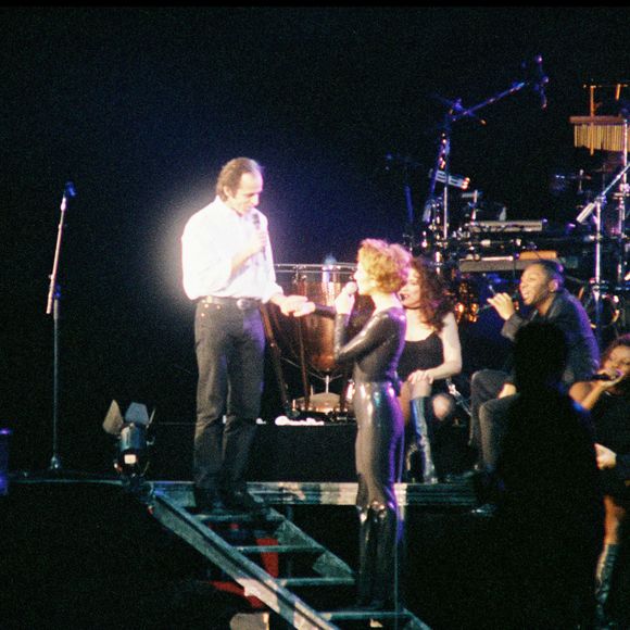 Archives - Céline Dion et Jean-Jacques Goldman lors du concert de Céline Dion au Stade de France à Paris.
Crédit : AGENCE / BESTIMAGE