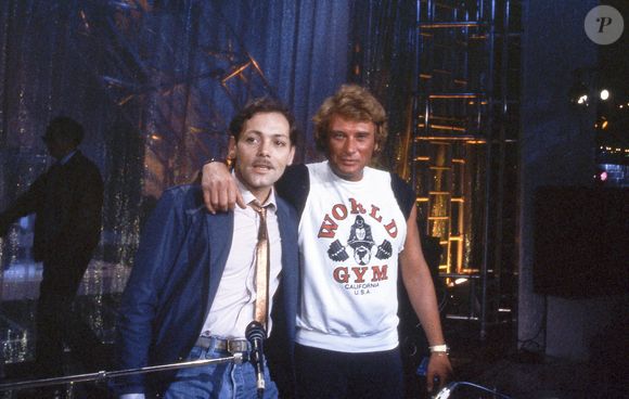 Julien Clerc évoque un échange "très cordial" avec Patrick Dewaere après des années de silence… 

Archives - Patrick Dewaere et Johnny Hallyday en 1981 @JLPPA / Bestimage