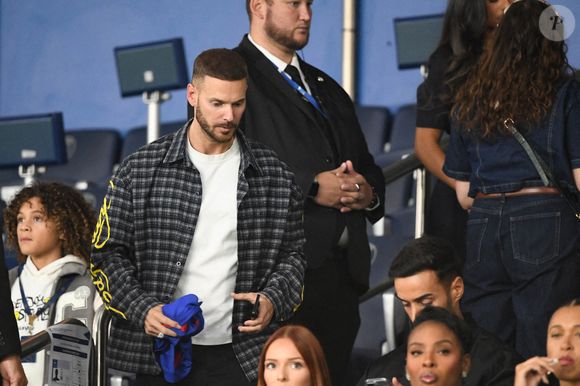 M Pokora et sa compagne Christina Milian au Parc des Princes lors du match de qualification pour la Coupe du monde entre la France et l'Islande. Paris, France, 9 septembre 2025. Photo by Florian Poitout/ABACAPRESS.COM