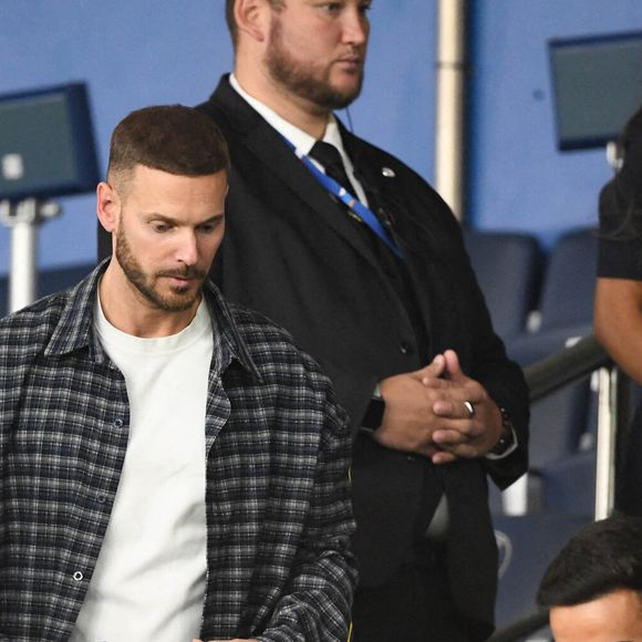 M Pokora et sa compagne Christina Milian au Parc des Princes lors du match de qualification pour la Coupe du monde entre la France et l'Islande. Paris, France, 9 septembre 2025. Photo by Florian Poitout/ABACAPRESS.COM