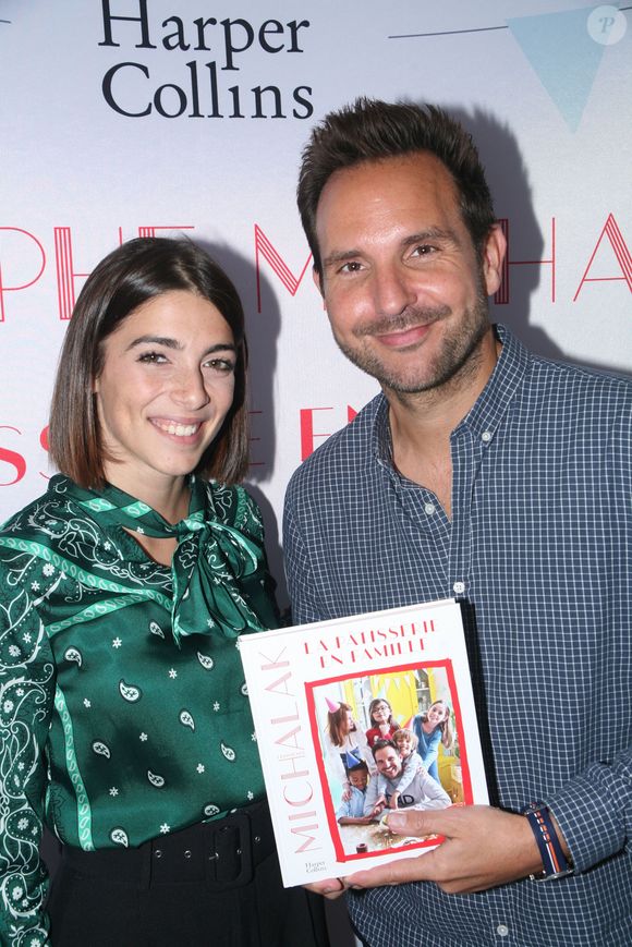Léa Paci, Christophe Michalak - Sortie du Livre de Christophe Michalak "la Patisserie en Famille" à Paris le 9 octobre 2019. 

© JLPPA/Bestimage