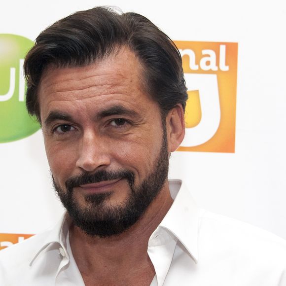 Olivier Minne au photocall de la rentrée TV des chaînes Canal J, Gulli et Tiji, au restaurant "La Gare" à Paris, le 30 juin 2016.
© Pierre Perusseau/Bestimage