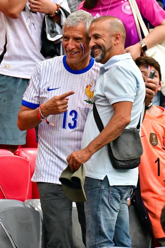 Nagui dans les tribunes de la demi-finale du Championnat d'Europe de football (Euro 2024) entre l'Espagne et la France (2-1) à Munich, Allemagne, le 9 juillet 2024. © Bestimage
