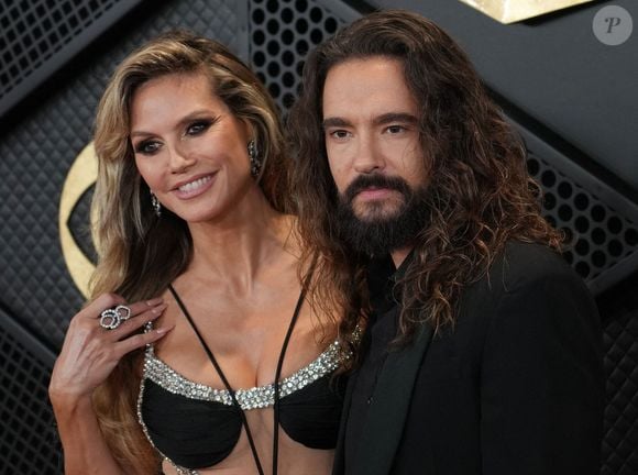 (G-D) Heidi Klum et Tom Kaulitz arrivent à la 66e cérémonie annuelle des Grammy Awards qui se tient à la Crypto.com Arena à Los Angeles, CA, USA, le dimanche 4 février 2024. Photo de Sthanlee B. Mirador/SPUS/ABACAPRESS.COM