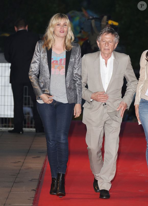 Roman Polanski et Emmanuelle Seigner arrivent à la première du film "Blue Jasmine" à Paris le 27 août 2013. © Denis Guignebourg / Bestimage
