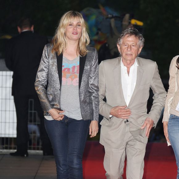 Roman Polanski et Emmanuelle Seigner arrivent à la première du film "Blue Jasmine" à Paris le 27 août 2013. © Denis Guignebourg / Bestimage