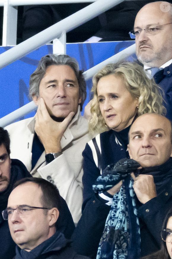 Laurent Solly et Caroline Roux - Personnalités à la finale de la coupe du monde de rugby Afrique du Sud / Nouvelle Zélande (12 - 11) au stade de France à Saint-Denis le 28 octobre 2023.